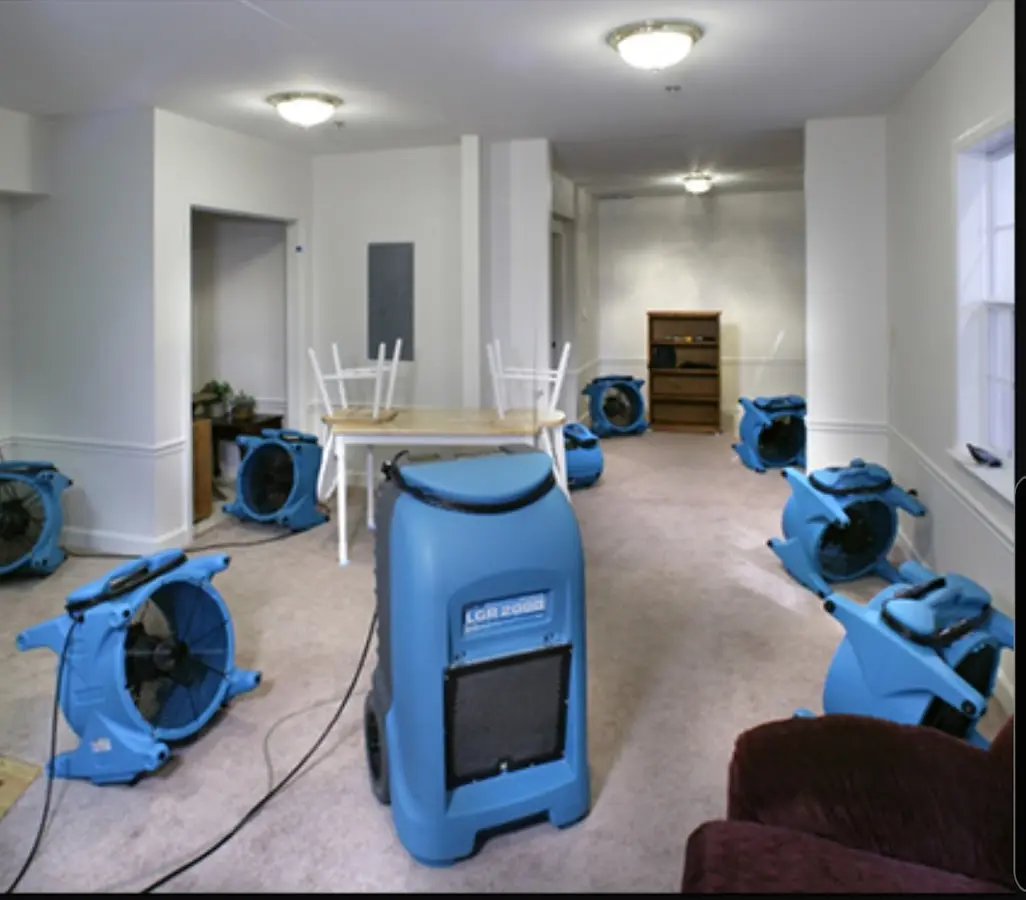 Air movers and dehumidifier setup for Water Damage Restoration in Tewksbury